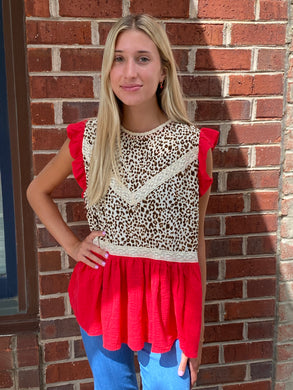 red animal print top