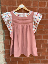 top with striped sleeves