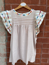 top with striped sleeves