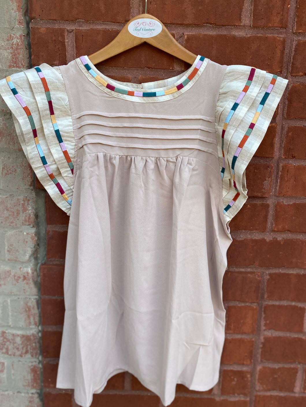 top with striped sleeves