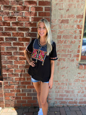 black embroidered top